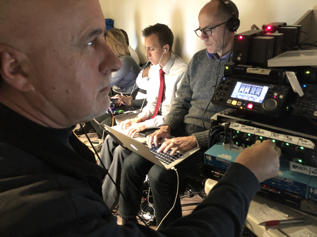 Steve Theroux manning the mixer in a courtroom robotic setup for 48 Hours.